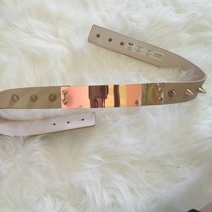 Gold stud plated belt.