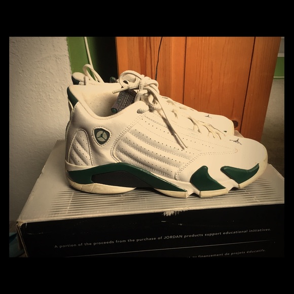 Green and white Jordans