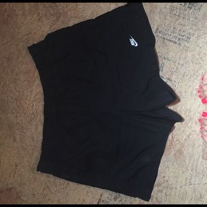 Black Nike shorts.