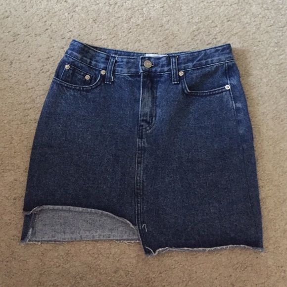 New Denim skirt with unsymmetrical detail
