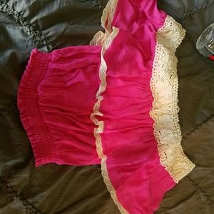 Pink and cream colored crop top
