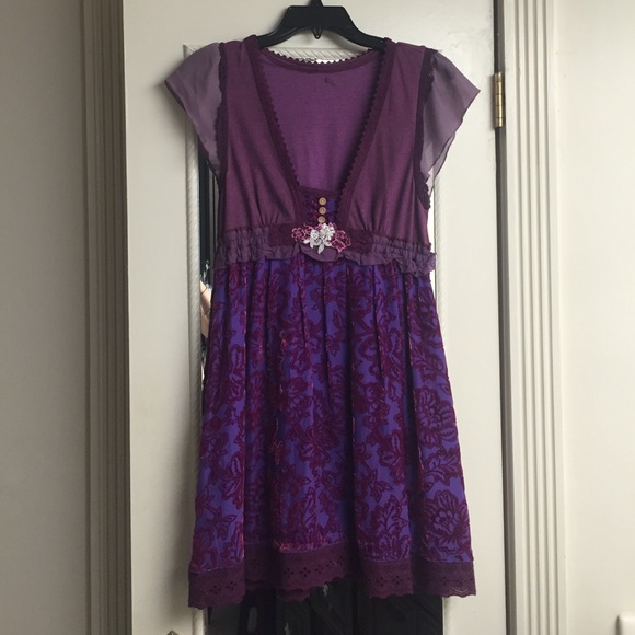 Free people dress with lace, velvet and buttons.