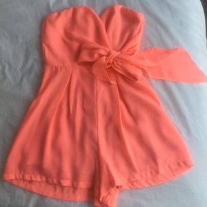 Neon pink/orange romper from Tobi.