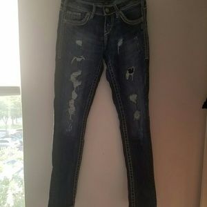 Size 25 slim straight destructed denim