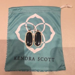 Kendra Scott gold "Danielle" earrings in black.