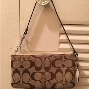 Coach clutch/wristlet
