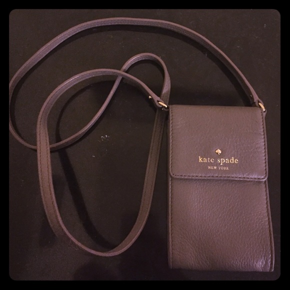 Kate Spade satchel purse. Inside wallet for cards.