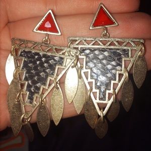Snake skin style dangly earrings with red detail