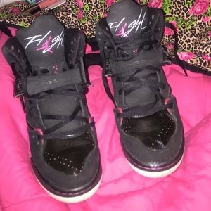 Hot pink and black Jordan flights