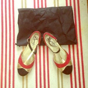 Gold/red/black leather T-strap flat by Seychelles.