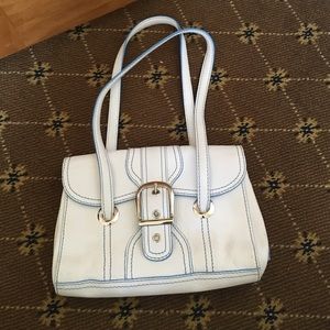 White pocketbook with light blue stitching