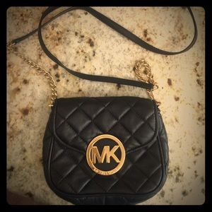Cross body purse by  Michael Kors