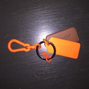 Coach neon orange hangtag fob
