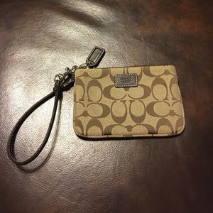 Authentic Signature COACH Wristlet. Brown