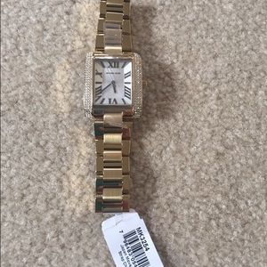 Gold womans Michael Kors watch