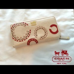 Coach Cream w/Sewn Leather "C" ,detailing.