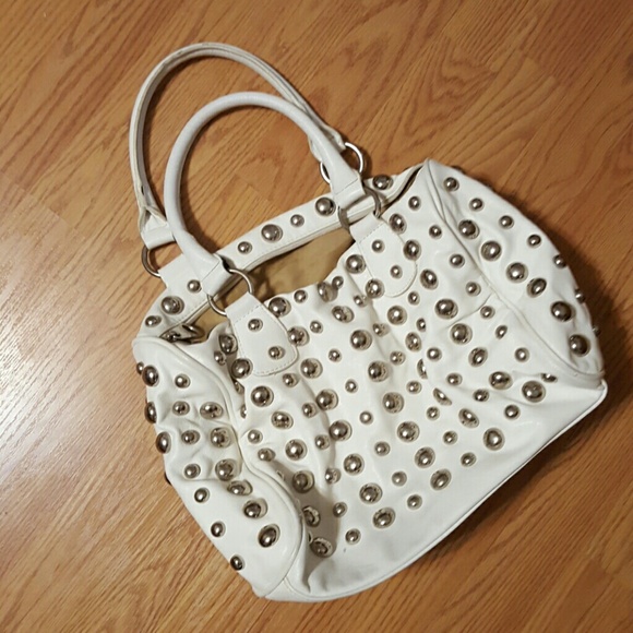 white purse with stud detail
