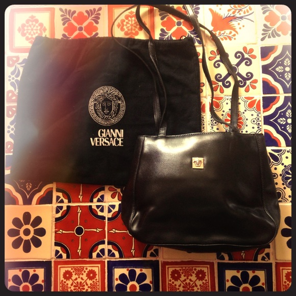 Vintage black leather "Versace" shoulder bag.