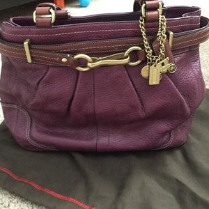 Coach distressed dark purple handbag