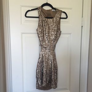 Gold sequin cut out dress