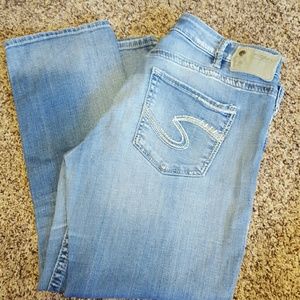 Silver Capris lightly worn