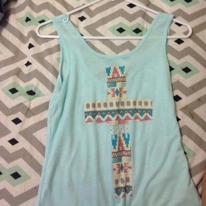 light blue tank with cross on it