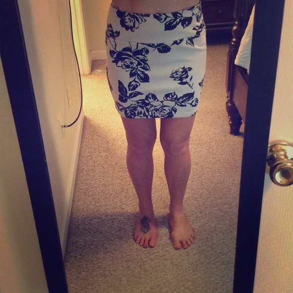 Beige and black floral mini skirt