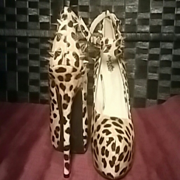 Patten leather studded high heels