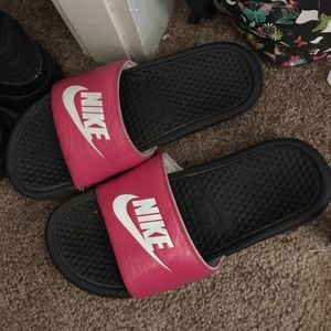 pink Nike slides