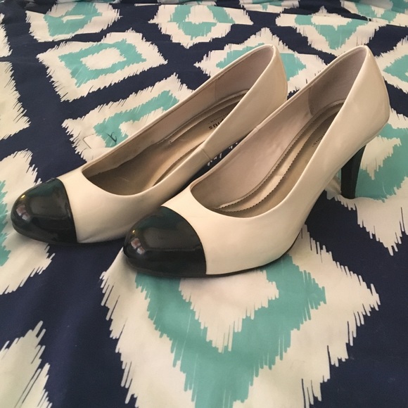 Cream and black low heels