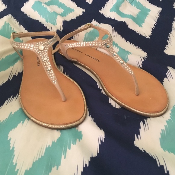 Peach tan sandals with gold trim