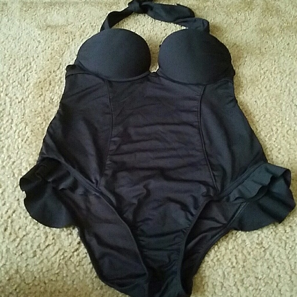 One piece swimsuit with miraculous cups attached