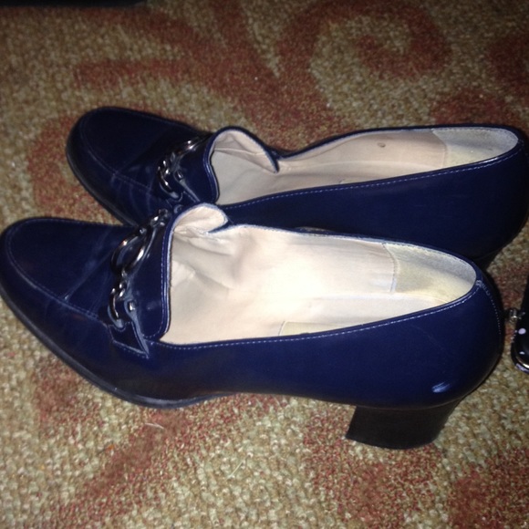 Dark blue heels with silver circles attached