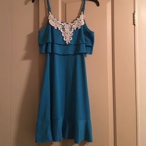 Turquoise sundress. Lace neckline.