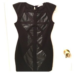 Figure flattering black mini dress