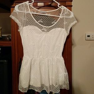 Delia's white blouse