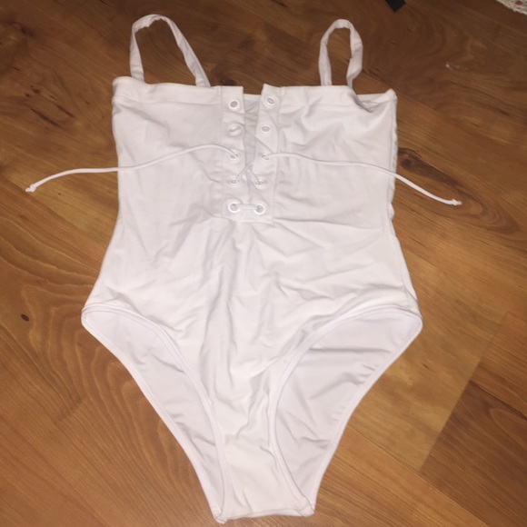 Never worn White lace up one piece suit