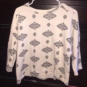 Somewhat long sleeve Aztec shirt.