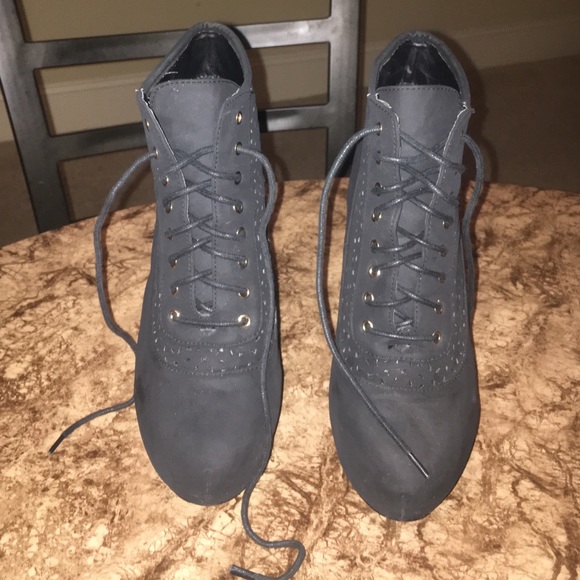 All black lace up high heels.