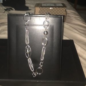 Long strand silver statement necklace