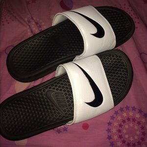 NIKE women's slides.