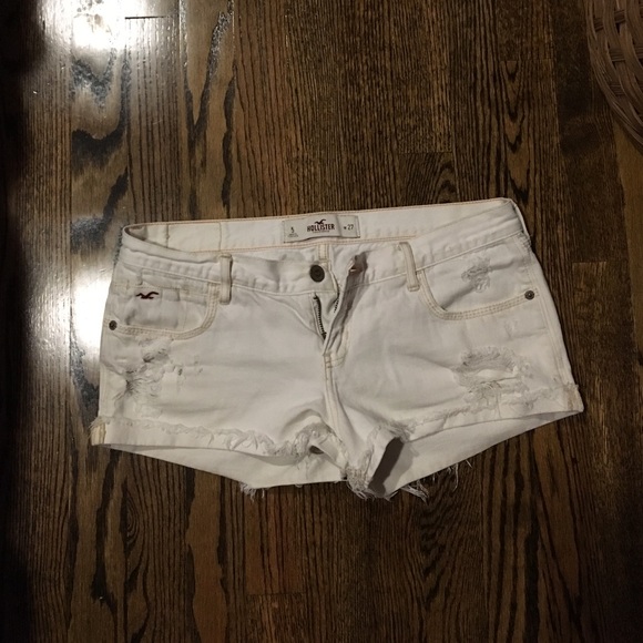 White ripped shorts