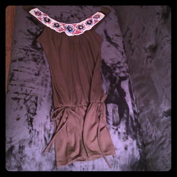 Brown sundress. Very flattering.