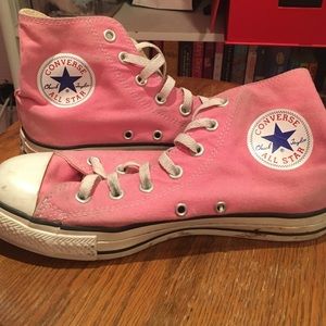 Pink high top Chuck Taylor