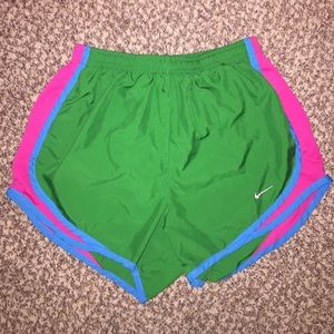 Green, Pink, and Blue nike dri-fit tempo shorts