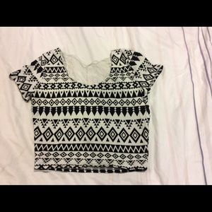 Tribal crop top with lace in the back.