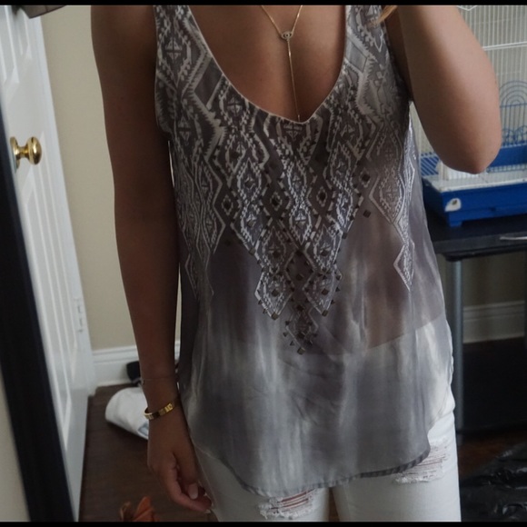 Gray flowy top with studs