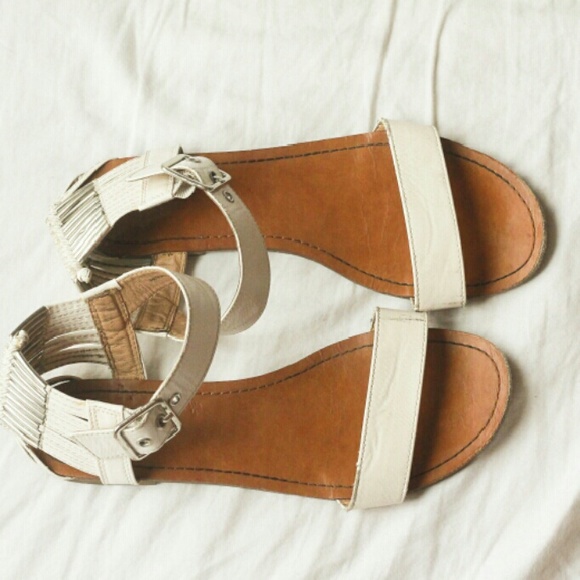 White and tan strap sandals. Gently used