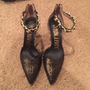 Gold and black heels