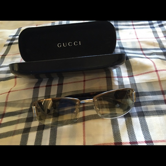 Sunglasses with case and cleaning cloth .